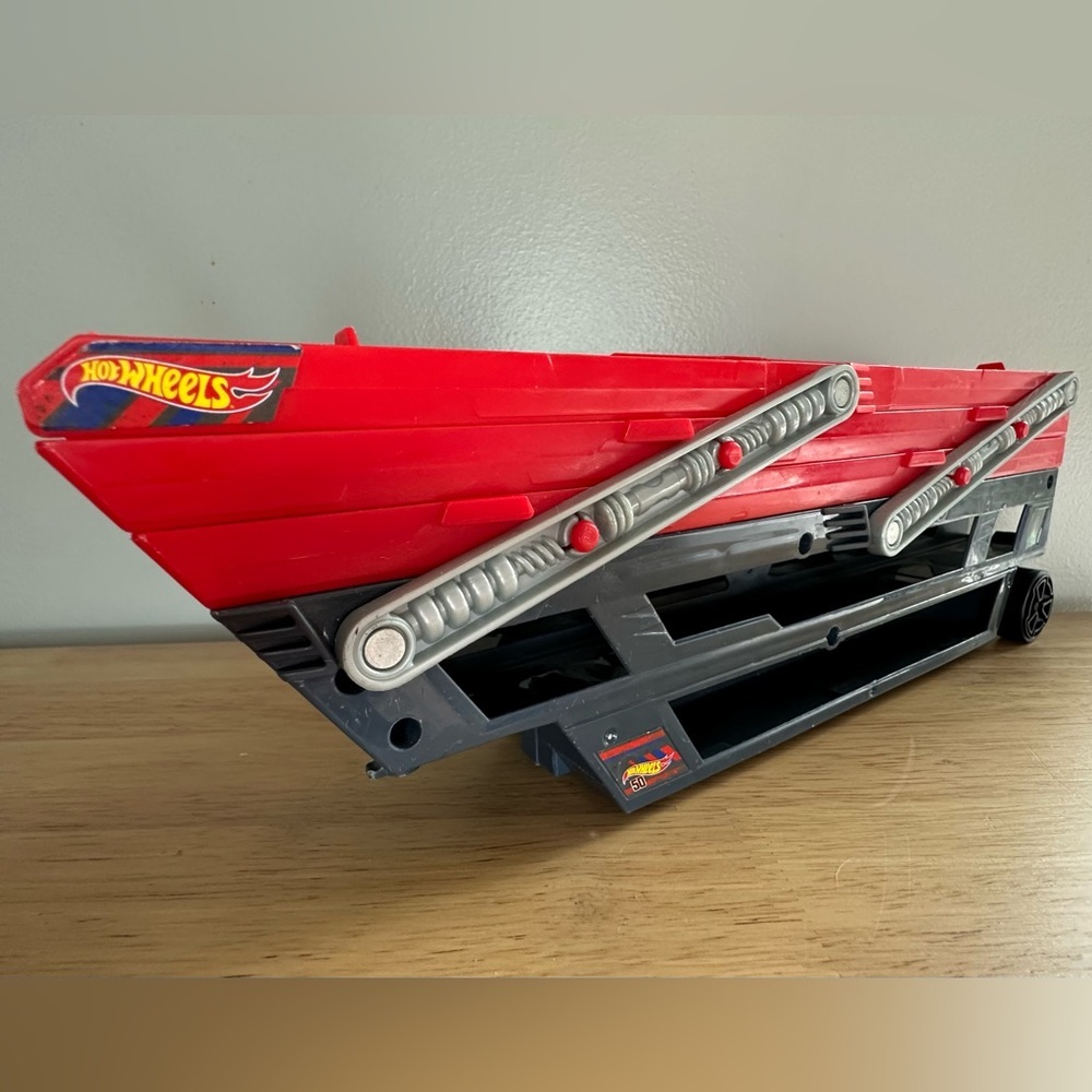 Hot Wheels Mega Hauler Truck bed holds up to 50 cars six expandable levels